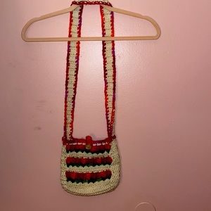 Hand-made knitted crochet cross-body bag.
